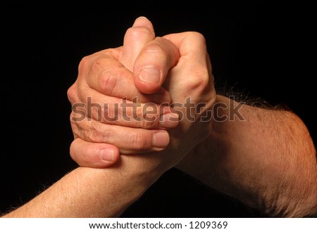 Two people meet and shake hands