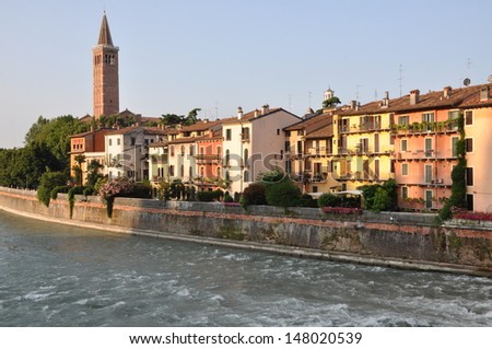Colored houses of Verona on the river Adige, Italy