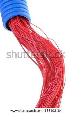 Corrugated pipe with red cables isolated on white background