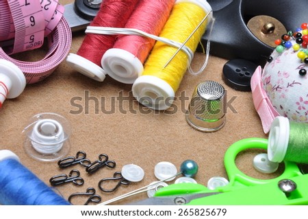 Sewing kit tailor\'s tools scissors, spool of thread, needle, thimble