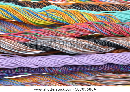 Multicolored telecommunication and computer cables