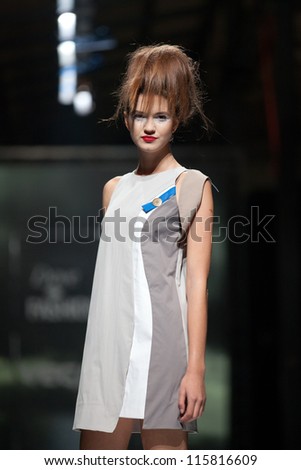 ZAGREB, CROATIA - OCTOBER 10: Fashion model wears clothes made by Marina Design on 'Fashion.hr' show, on October 10, 2012 in Zagreb, Croatia.
