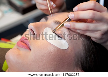 ZAGREB, CROATIA - OCTOBER 27: Lash maker builds up long artificial eyelashes in backstage during the Zagreb Bridal show, on October 27, 2012 in Zagreb, Croatia.