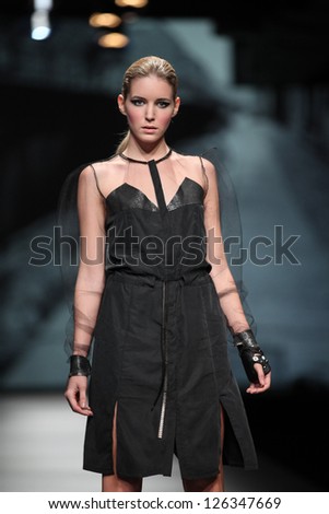 ZAGREB, CROATIA - OCTOBER 18: Fashion model wears clothes made by Jet Lag at 'Croaporter' fashion show, on October 18, 2012 in Zagreb, Croatia.