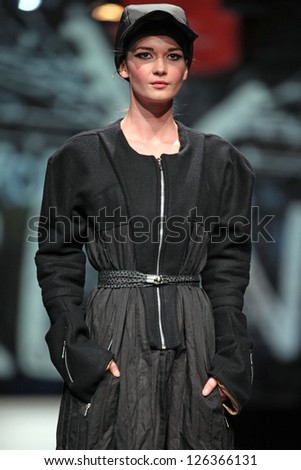 ZAGREB, CROATIA - OCTOBER 18: Fashion model wears clothes made by Jet Lag at \'Croaporter\' fashion show, on October 18, 2012 in Zagreb, Croatia.