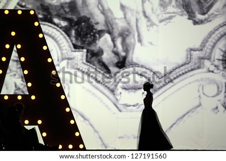 ZAGREB, CROATIA - OCTOBER 19: Silhouette of a fashion model wearing clothes made by Monika Sablic at \'Croaporter\' fashion show, on October 19, 2012 in Zagreb, Croatia.