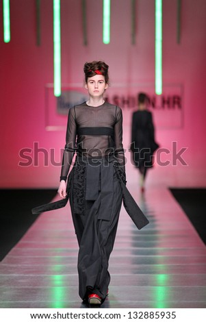  - stock-photo-zagreb-croatia-march-fashion-model-on-catwalk-wearing-clothes-designed-by-morana-krklec-on-132885935