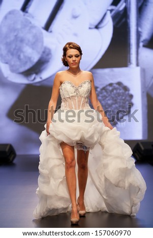 ZAGREB, CROATIA - OCTOBER 5: Fashion model in wedding dress on \'Wedding days\' show on October 5, 2013 in Zagreb, Croatia.
