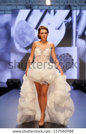ZAGREB, CROATIA - OCTOBER 5: Fashion model in wedding dress on \'Wedding days\' show on October 5, 2013 in Zagreb, Croatia.