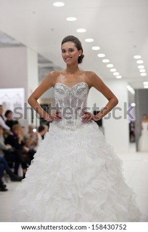 ZAGREB, CROATIA - OCTOBER 12: Fashion model wears wedding dress at \'Wedding expo\' fashion show, on OCTOBER 12, 2013 in Zagreb, Croatia.