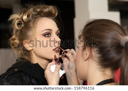 ZAGREB, CROATIA - OCTOBER 17: Fashion model prepares in backstage for Couture show by Marina Design on \'Fashion.hr\' show, on October 17, 2012 in Zagreb, Croatia.