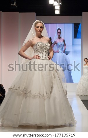 ZAGREB, CROATIA - FEBRUARY 15, 2014: Fashion model in wedding dress on \'Wedding days\' show
