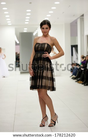ZAGREB, CROATIA - FEBRUARY 22, 2014: Fashion model in bridesmaid dress on \'Wedding expo\' show