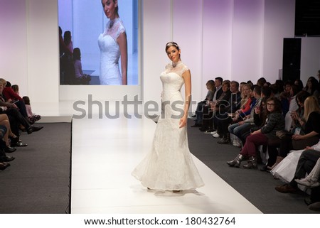 ZAGREB, CROATIA - FEBRUARY 15, 2014: Fashion model in wedding dress on 'Wedding fair' show