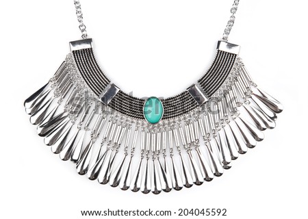 Detail of a silver statement necklace isolated on white Detail of a silver statement necklace isolated on white