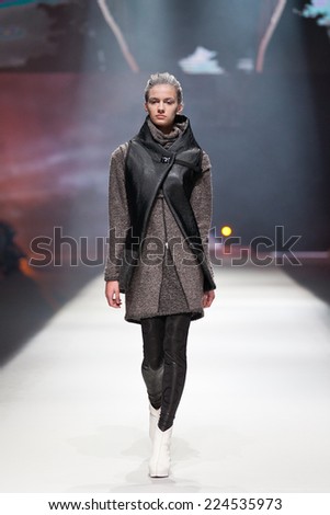 ZAGREB, CROATIA - OCTOBER 18, 2014: Fashion model wearing clothes designed by Marina Design on the \'Fashion.hr\' fashion show