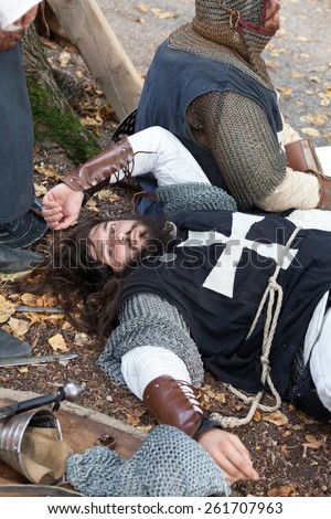 ZAGREB, CROATIA - OCTOBER 07, 2012: Young knight resting after the battle at \