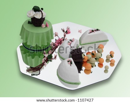 Springtime marzipan food arrangement on green