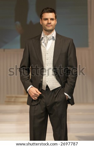 stock photo Groom's wedding suit on a young model