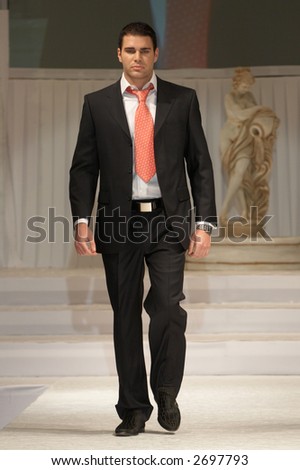 stock photo Black groom's wedding suit on a young model