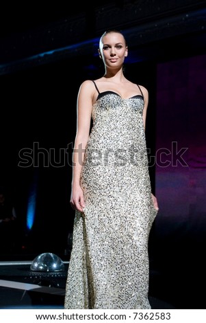 Fashion model in a sparkling dress