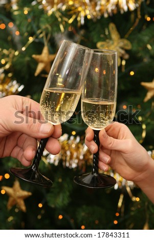 Two glasses of champagne on Christmas Eve