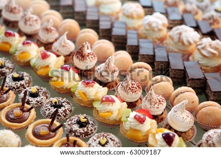 Diversity of pastry decorated with fruit