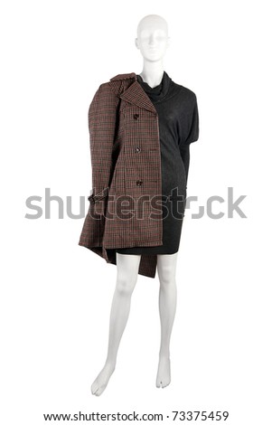 Mannequin dressed in gray dress and a coat, isolated on white