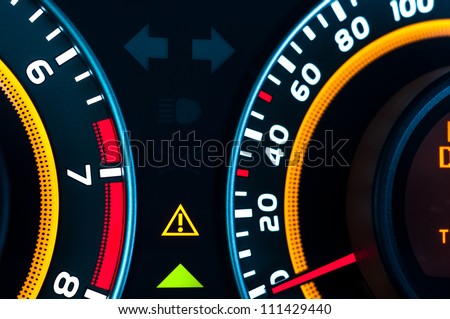 Car speed meter closeup in vibrant colors