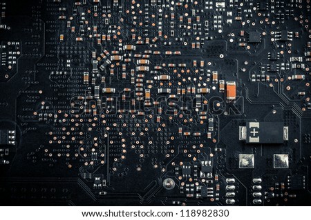 Electronic board closeup photo in dar colors