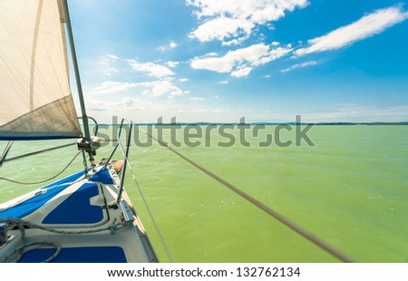 Sailing boat on the water in sunshine