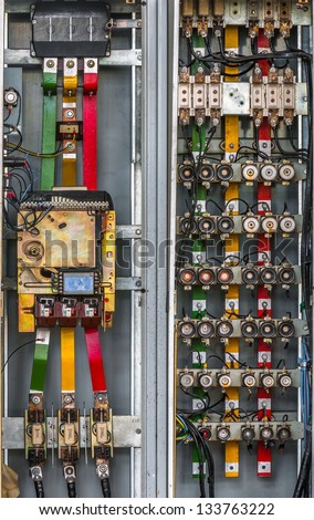 Industrial fuse box on the wall closeup photo