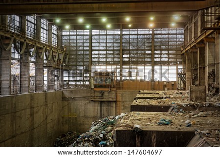 Waste processing plant interior with garbage