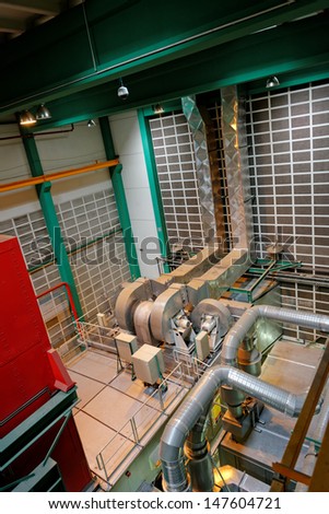 Large industrial interior with power generator in a building