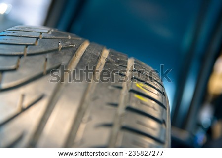 New car tyre closeup photo with detail