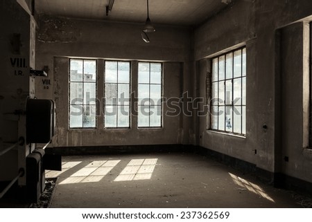 Dark and abandoned interior of a power plant