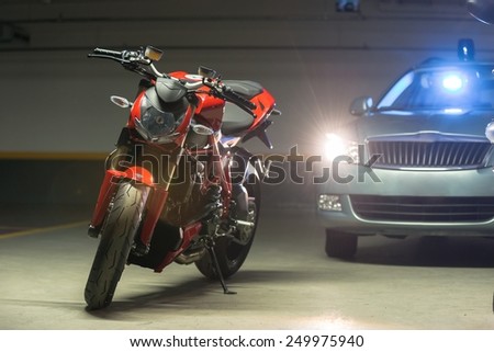 Photo of a Motorcycle parking in garage