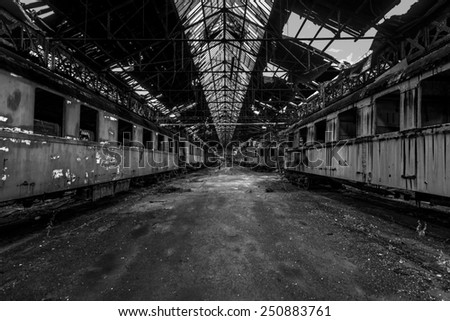 Cargo trains in old train depot eaten by rust