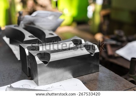 Polished steel products in metal industry closeup