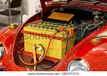 Modified car with large battery under engine bay