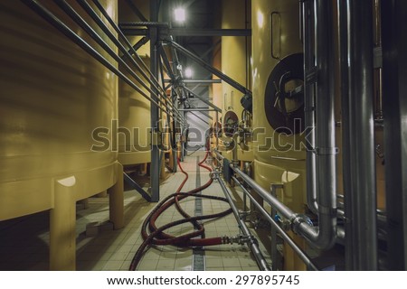 Industrial interior with welded silos angle shot
