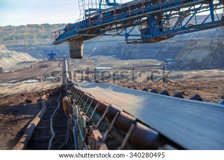 Long conveyor belt transporting ore to the power plant