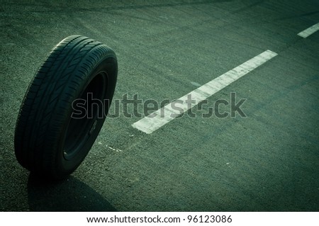 Car tire on the road