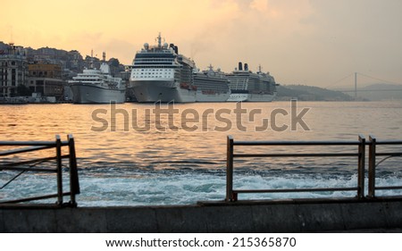 ISTANBUL, TURKEY - JULY 19, 2014: Cruise ships dock in Istanbul Harbor.  The ships bring thousands of tourists each year to visit Istanbul\'s many attractions.