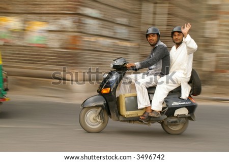 Two Men on a Motor Scooter in Delhi