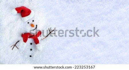 Happy snowman on snow background.