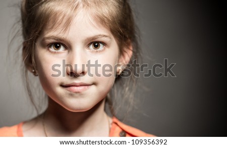 Little girl posing for her first model portfolio