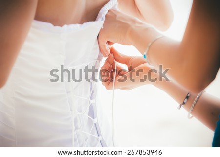 hand lace bridal corset on wedding dress