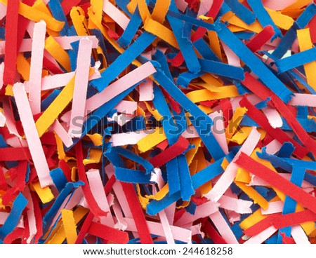 Shredded waste paper strips