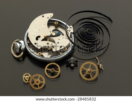 Pocket watch  open showing clockworks